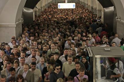 Пассажиры в московском метро 5 июня 2013 года