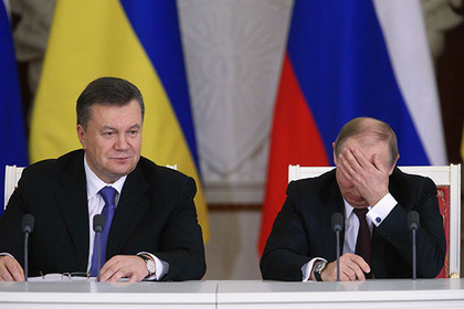 Владимир Путин и Виктор Янукович во время подписания соглашений о скидке на газ