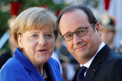 Ангела Меркель и Франсуа Олланд на встрече в Париже 2 октября