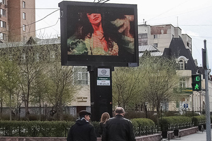 Рекламный ролик на улице в Тюмени