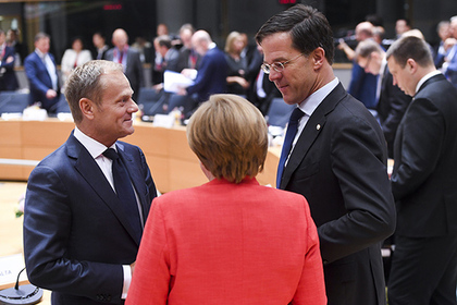  Председатель Европейского совета Дональд Туск, Ангела Меркель и Марк Рютте