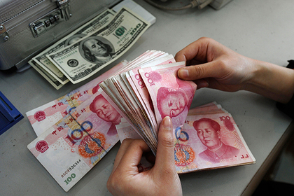 Назван срок отказа от доллара в расчетах с Китаем