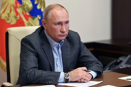 Путин пошутил об одновременно пропавших участнике совещания и штативе