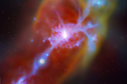 Симуляция поглощения холодного газа (синие нити) галактикой. Внизу слева виден квазар (он был наложен на симуляцию наряду со звездным фоном).