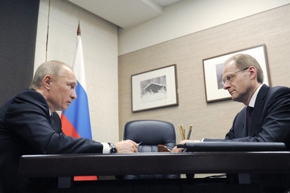 Владимир Путин (слева) и Василий Юрченко (справа) 
