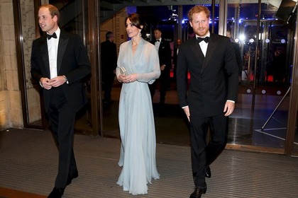 Герцог и герцогиня Кембриджские и принц Гарри (слева направо)