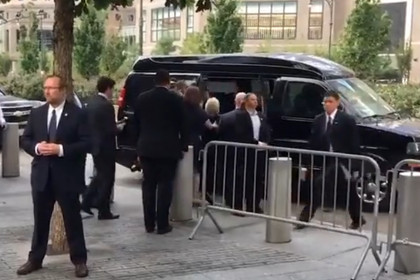 Очевидцы засняли на видео перегревшуюся на траурной церемонии Клинтон
