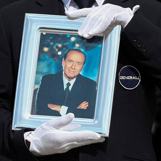 Путин объявил на ПМЭФ минуту молчания в память о Берлускони