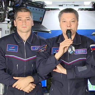 Космонавты на МКС поздравили россиян с Днем Конституции